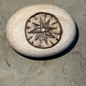 Wanderer’s Compass – Hand-Burned Pyrography Pebble