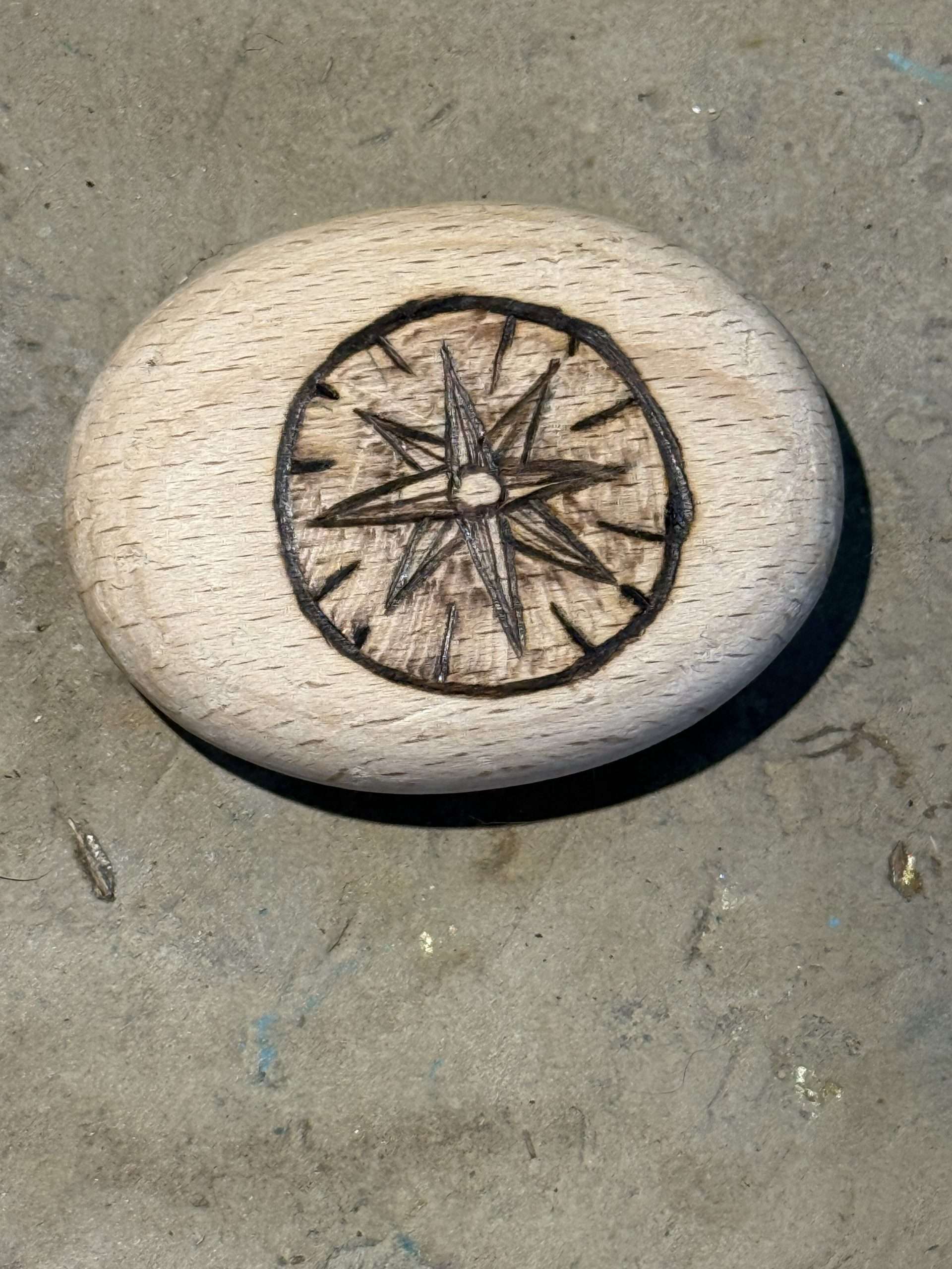 Wanderer’s Compass – Hand-Burned Pyrography Pebble