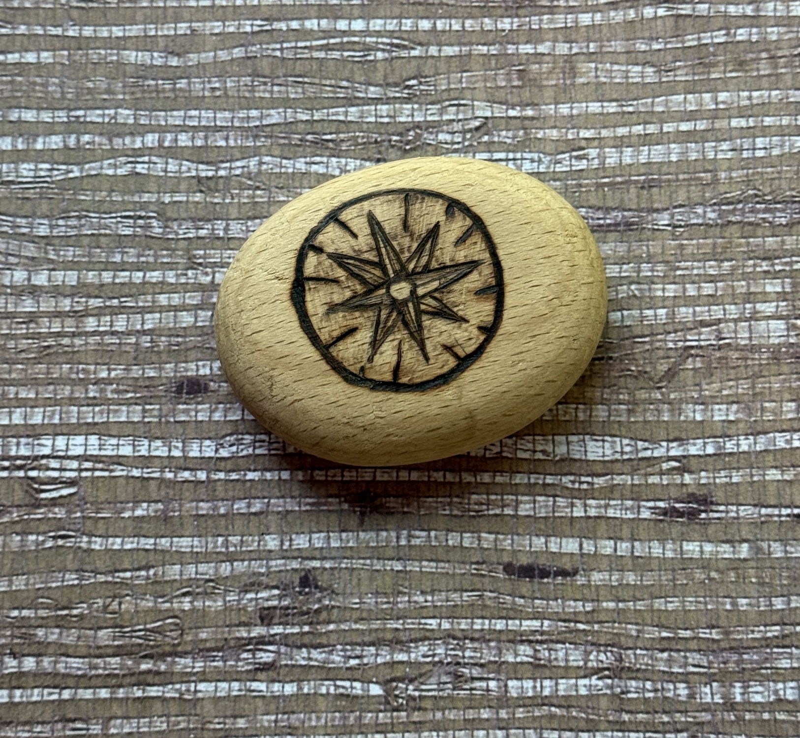 Wanderer’s Compass – Hand-Burned Pyrography Pebble