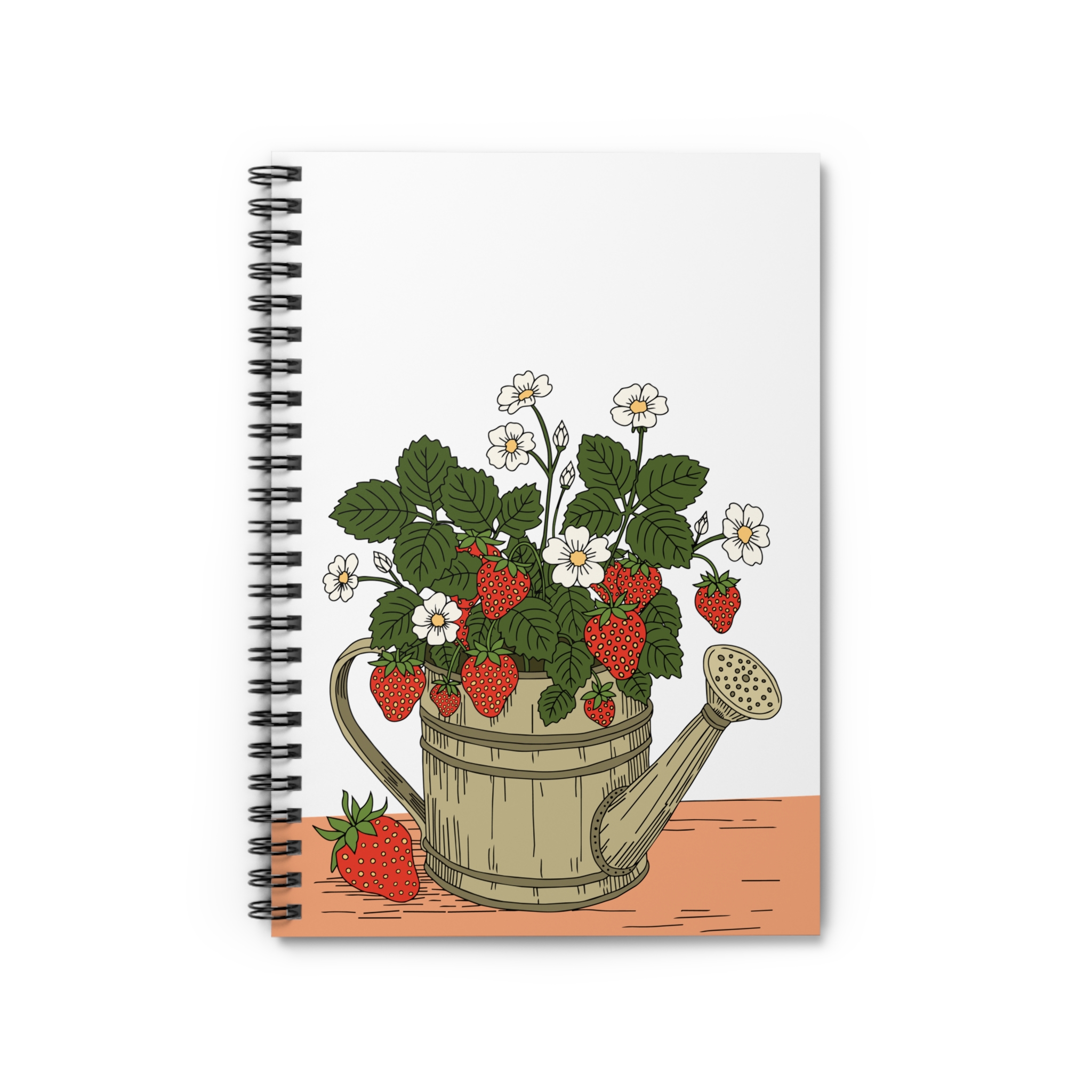 Spiral notebook featuring strawberry plants growing from a watering can with red berries, white flowers, green leaves, and cottage garden artwork.