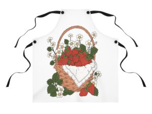 Strawberry basket apron design featuring illustrated red strawberries, white blossoms, green leaves, and a woven basket with cottage garden inspired artwork.